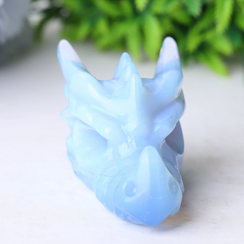 Tête de dragon sculptée en cristal d'opalite bleue de 2,7 pouces