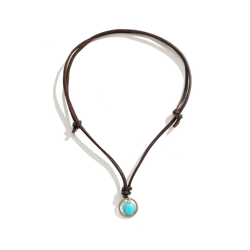 Collier pendentif rond turquoise avec symbole de force de protection