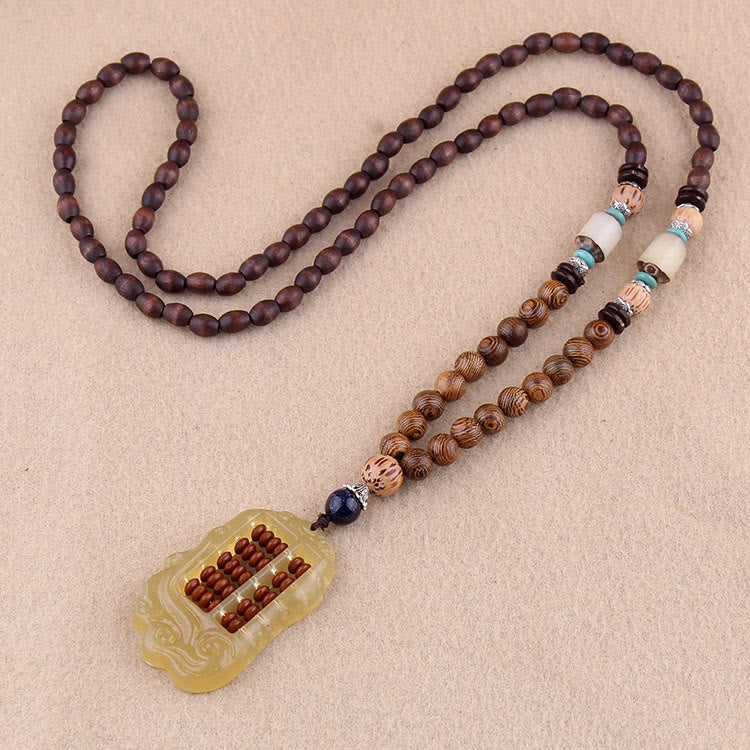 Collier d'équilibre en bois de wengé et agate pour la paix et la protection