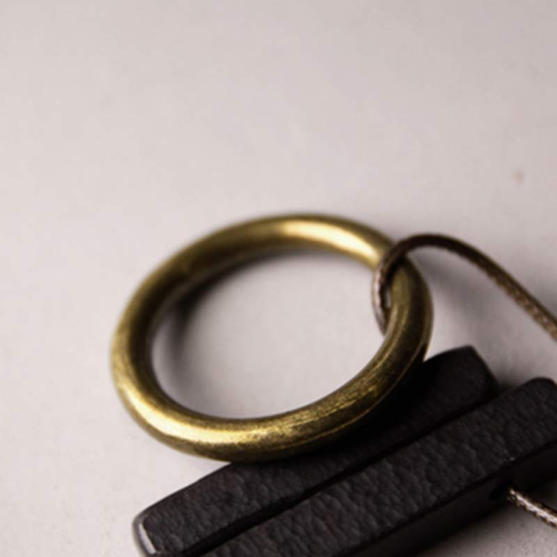 Collier Cercle Zen en Bois d'Ébène pour l'Illumination et le Calme