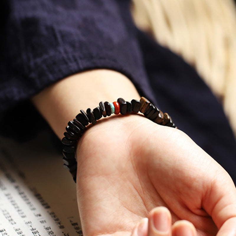 Bracelet d'équilibre en agate rouge et bois d'agar pour la méditation et la paix