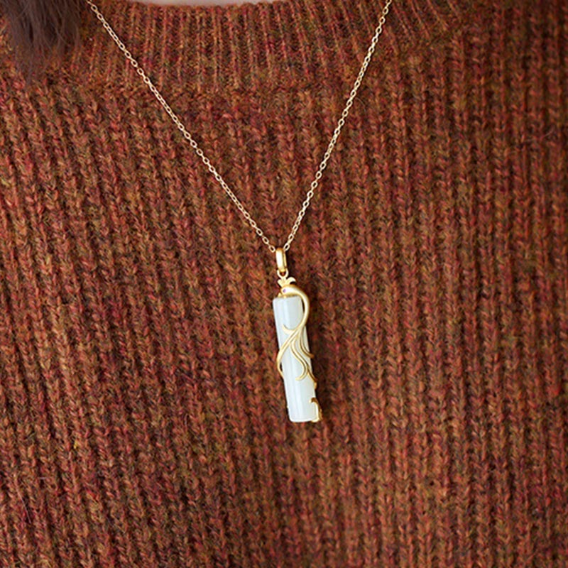 Collier pendentif dragon en jade blanc et cuivre pour la protection