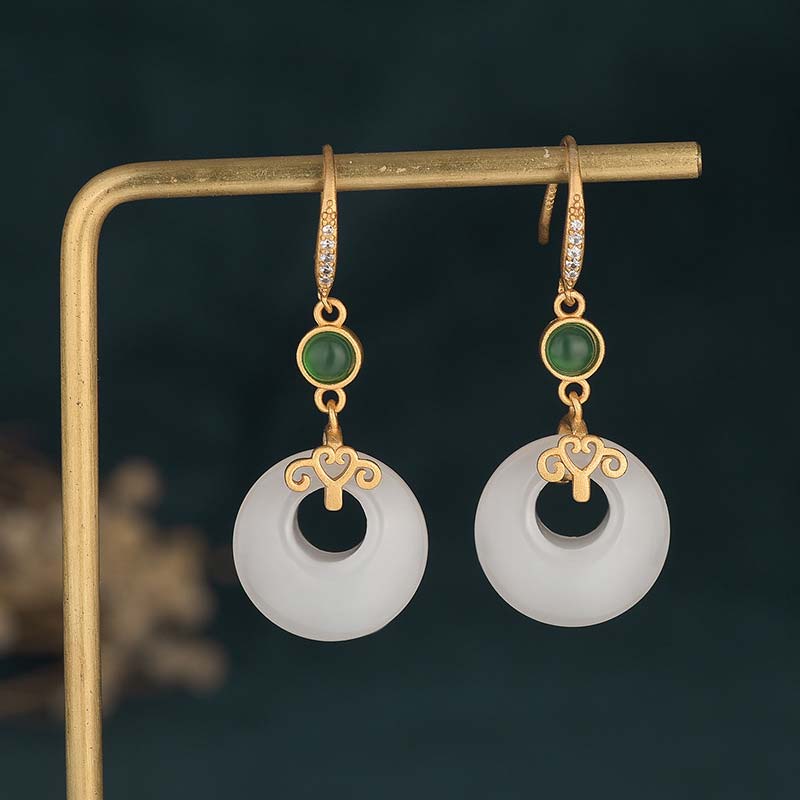 Boucles d'oreilles pendantes en jade blanc pour la protection et la chance