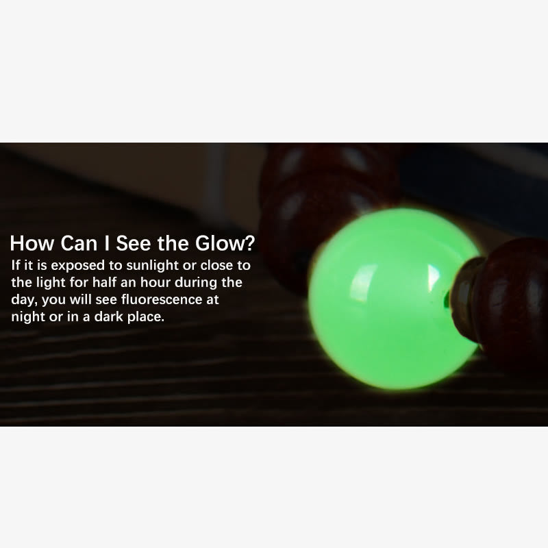 Porte-clés en bois d'ébène « Paix » | Perles lumineuses en bois de santal rouge et vert