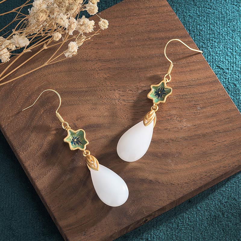 Boucles d'oreilles pendantes en jade blanc pour la protection et le bonheur