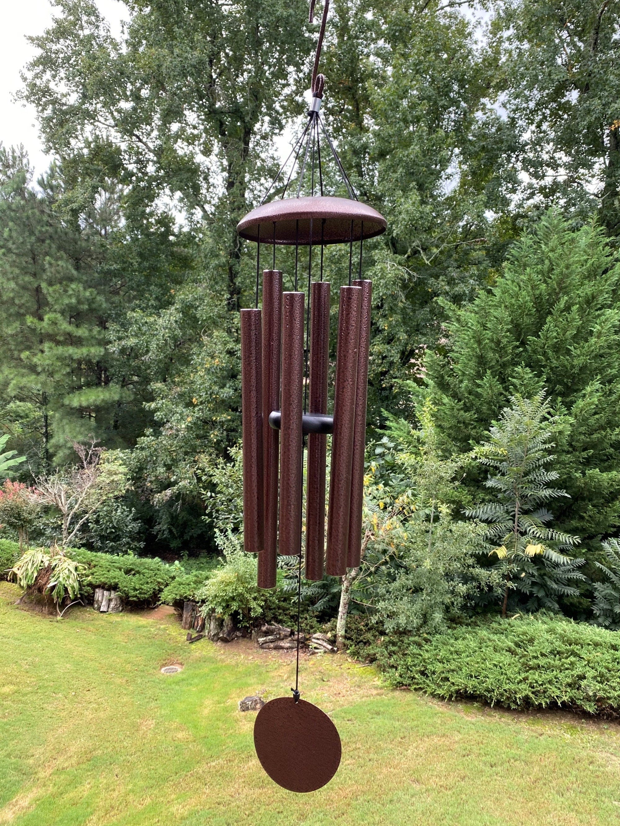 Deep burgundy wind chime with tubular bells and round weight for outdoor decor