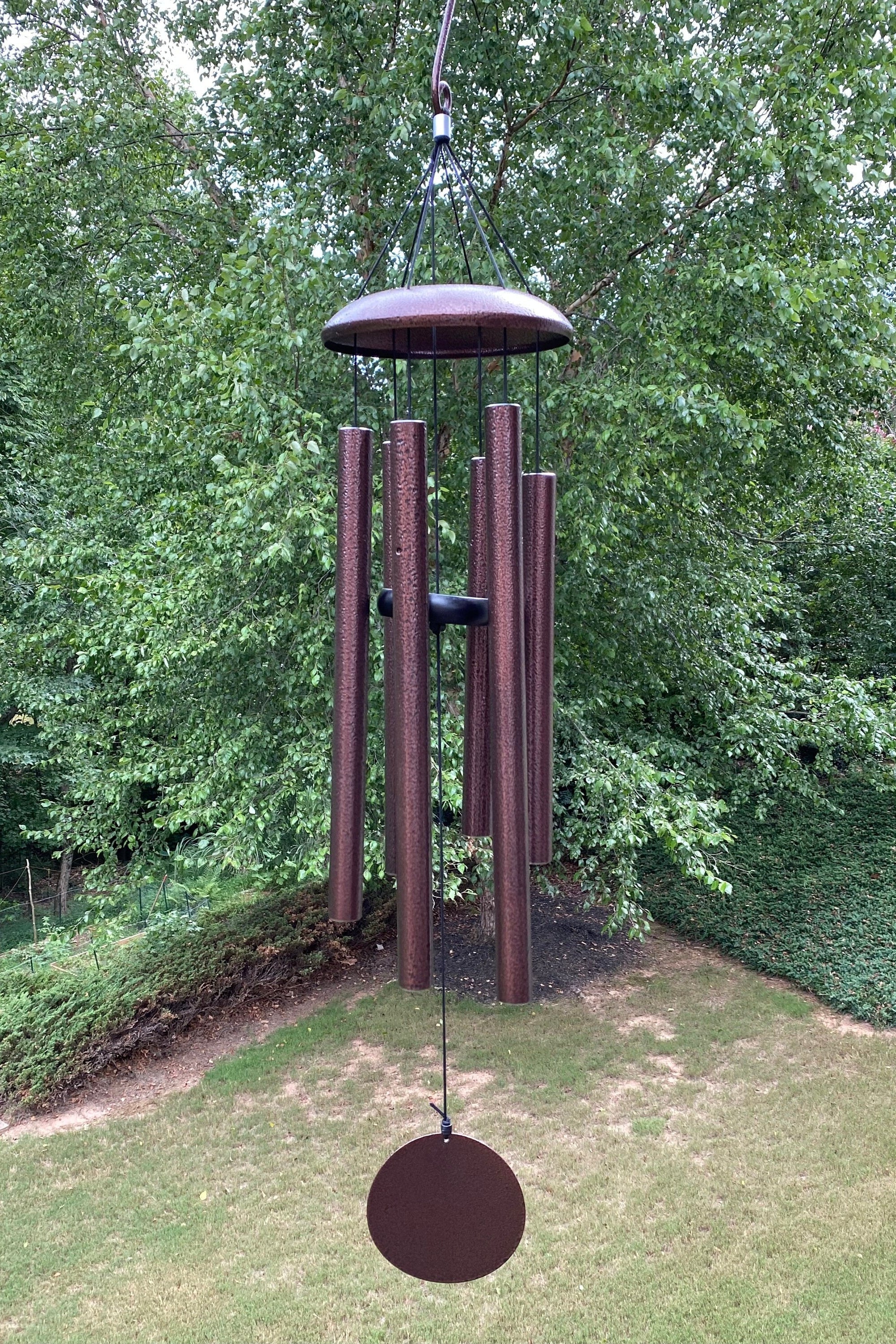 Bronze wind chime with multiple tubes for outdoor meditation and relaxation