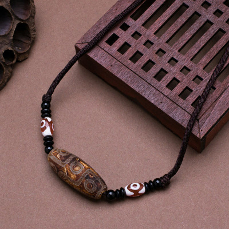 Collier unisexe en perles dzi à neuf yeux | Protection en agate
