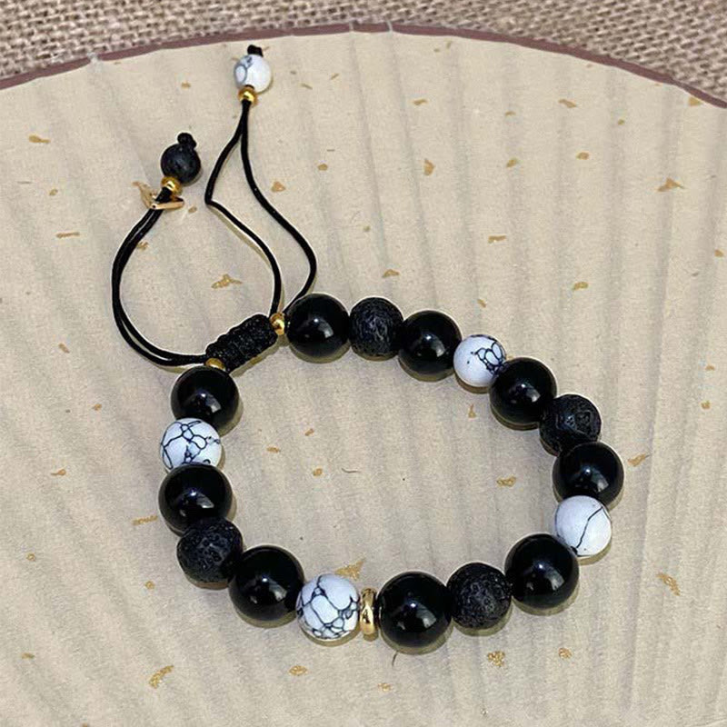 Bracelet Yin Yang en obsidienne noire et pierre de lave pour la force