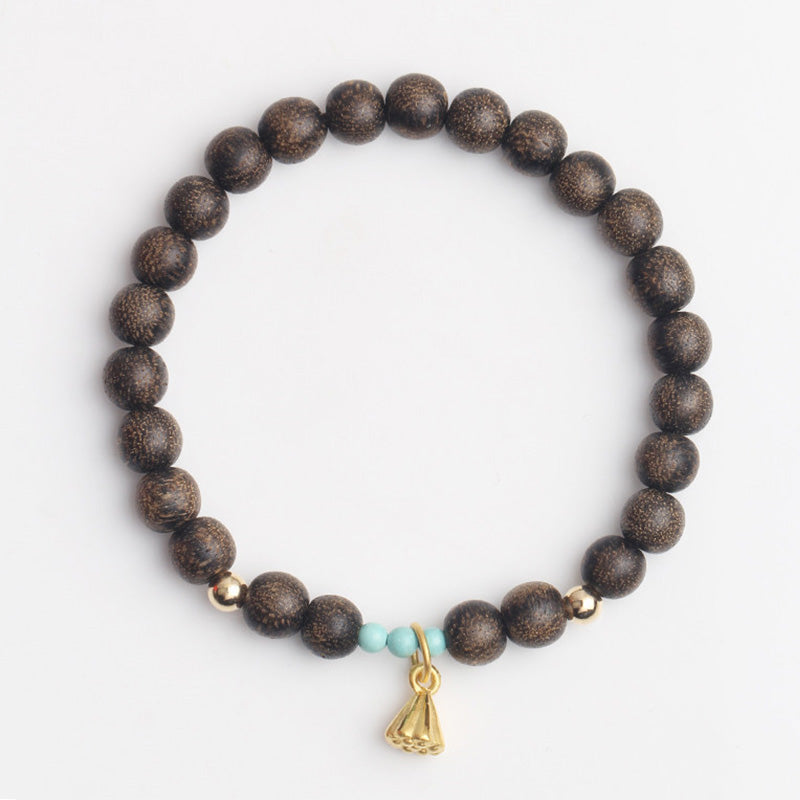 Bracelet de force en bois d'agar et lotus pour l'équilibre et le calme