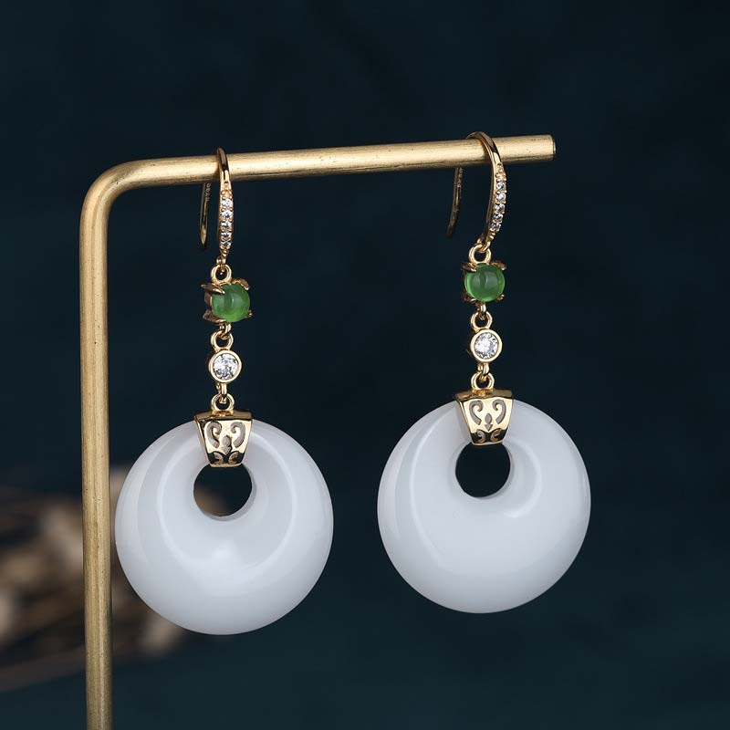 Boucles d'oreilles pendantes en jade blanc pour la protection et la chance