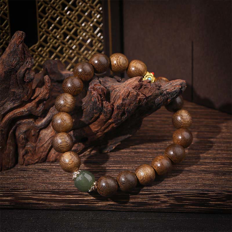 Bracelet porte-bonheur, force et calme en bois d'agar de 10 mm