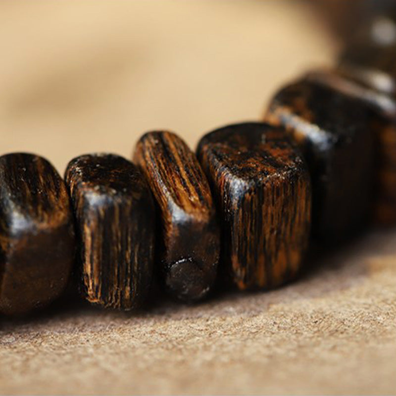 Bracelet d'équilibre en agate rouge et bois d'agar pour la méditation et la paix