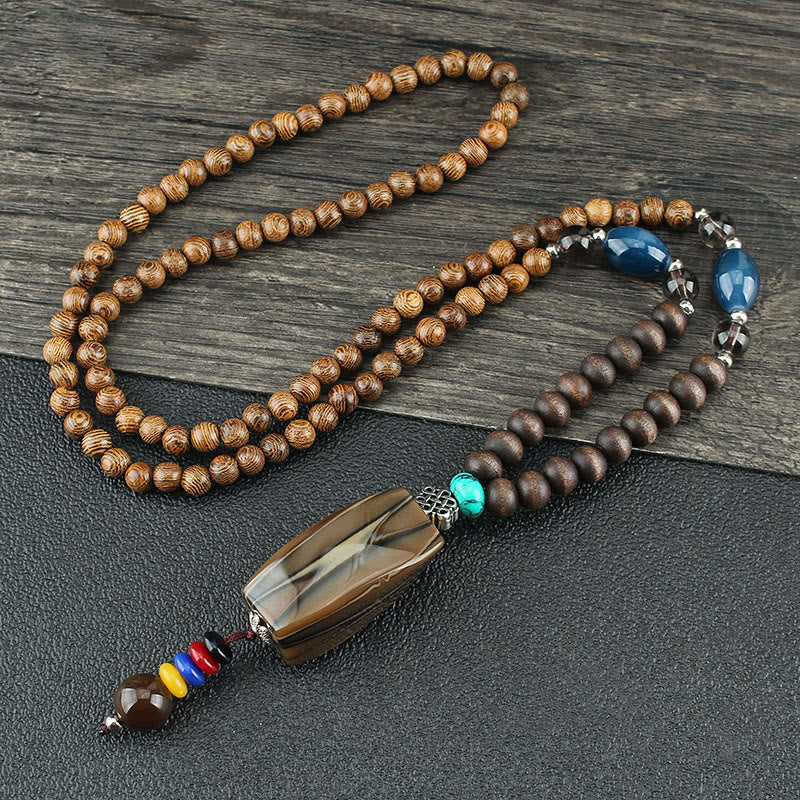 Collier d'équilibre en bois de wengé et agate pour la paix et la protection
