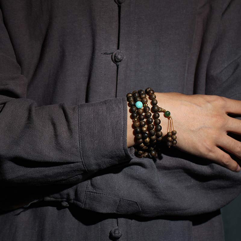 Bracelet Mala 108 perles en bois d'agar turquoise pour la méditation