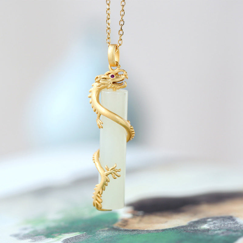 Collier pendentif dragon en jade blanc et cuivre pour la protection