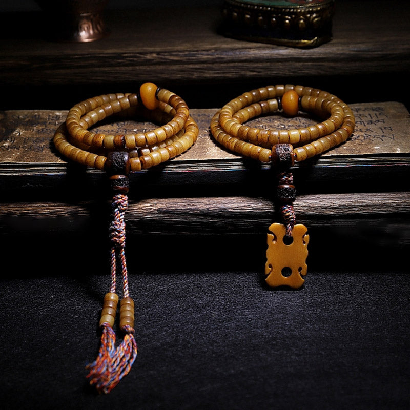 Bracelet Mala en os de yak et ambre à 108 perles pour l'équilibre