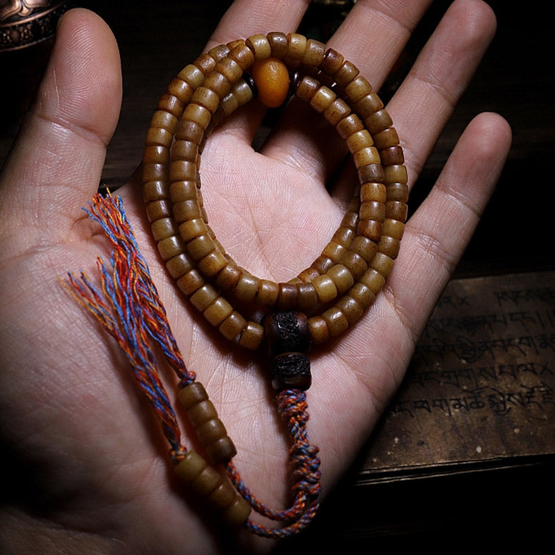 Bracelet Mala en os de yak et ambre à 108 perles pour l'équilibre