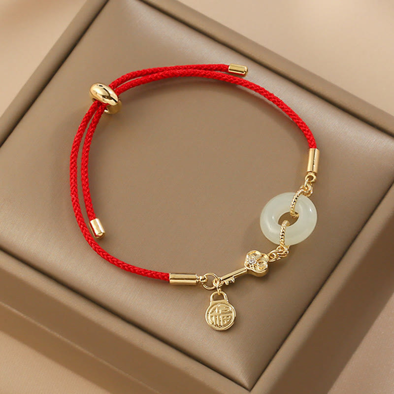 Bracelet porte-bonheur classique en jade Hetian et or 18 carats avec boucle de paix