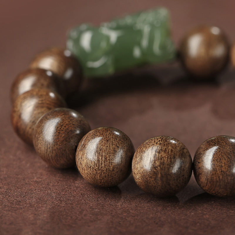 Bracelet de force en bois d'agar et jade Pi Xiu de 12 mm