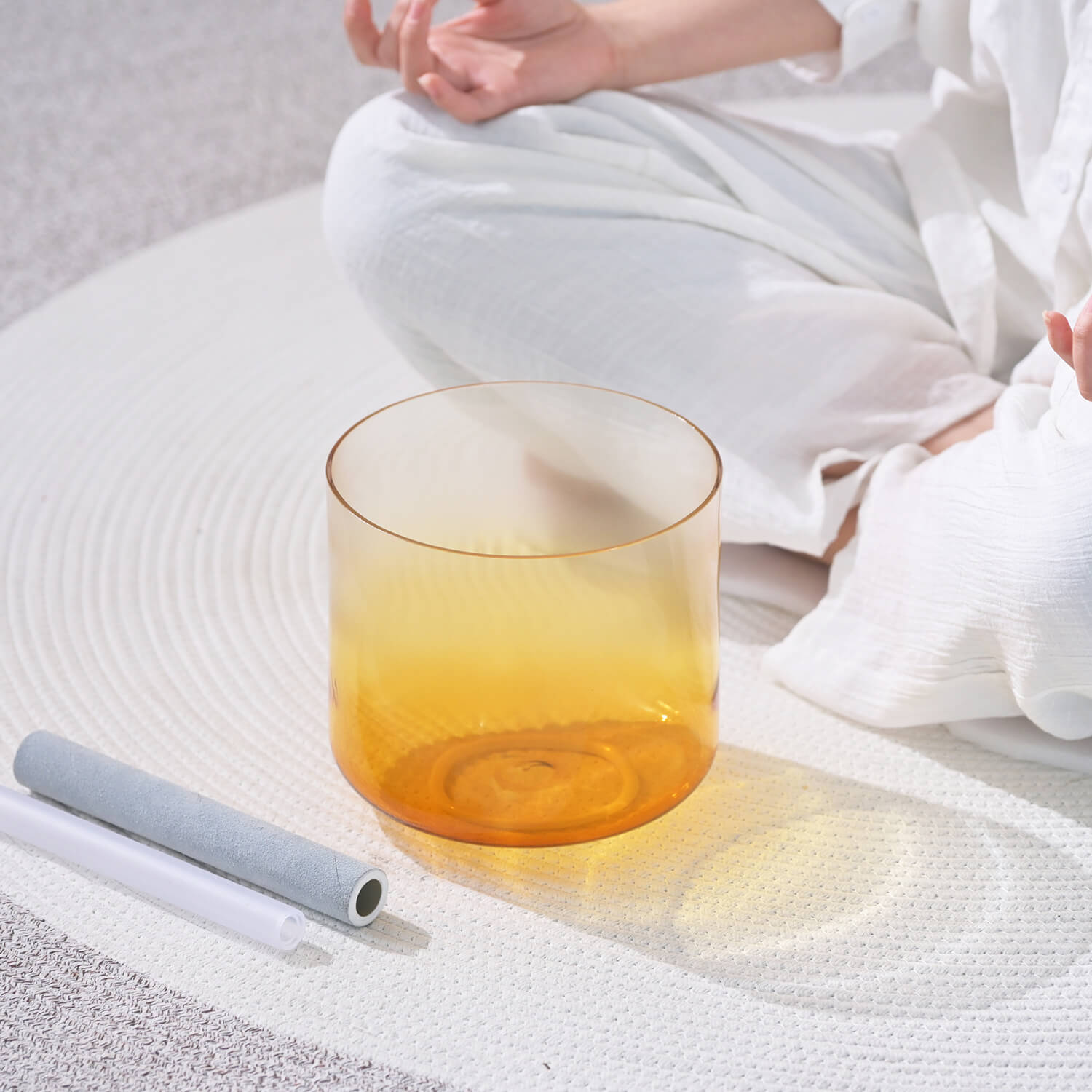 Amber-colored glass tumbler with gradient effect for Quartz Crystal Singing Bowl product