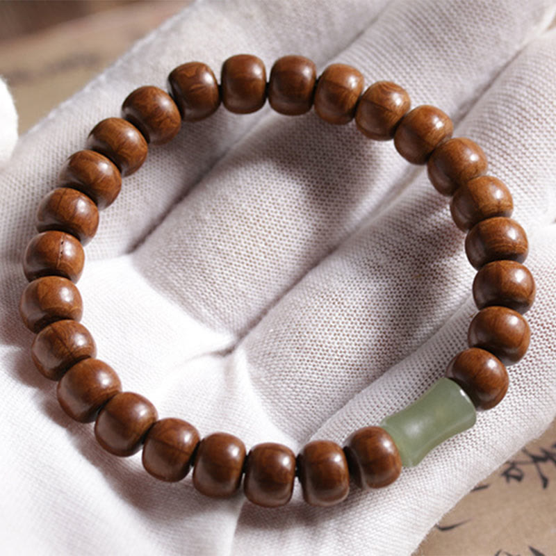 Bracelet de protection en bois d'Abelia Biflora et jade Hetian 6*8 mm