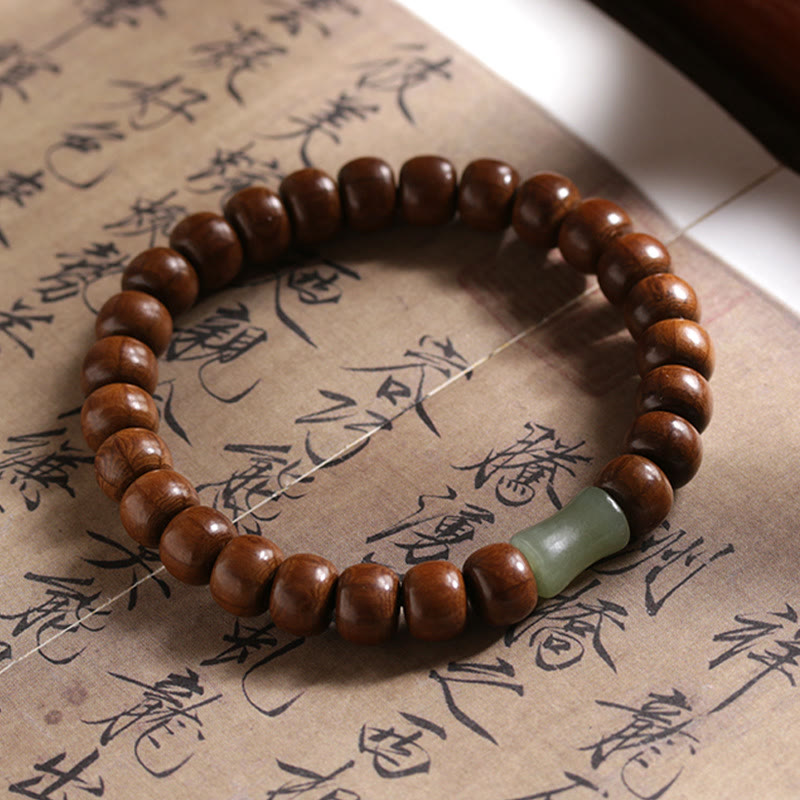 Bracelet de protection en bois d'Abelia Biflora et jade Hetian 6*8 mm