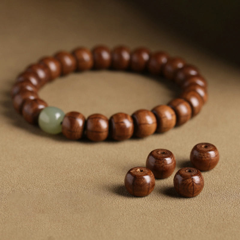 Bracelet de protection en bois d'Abelia Biflora et jade Hetian 6*8 mm