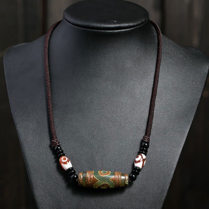 Collier unisexe en perles dzi à neuf yeux | Protection en agate