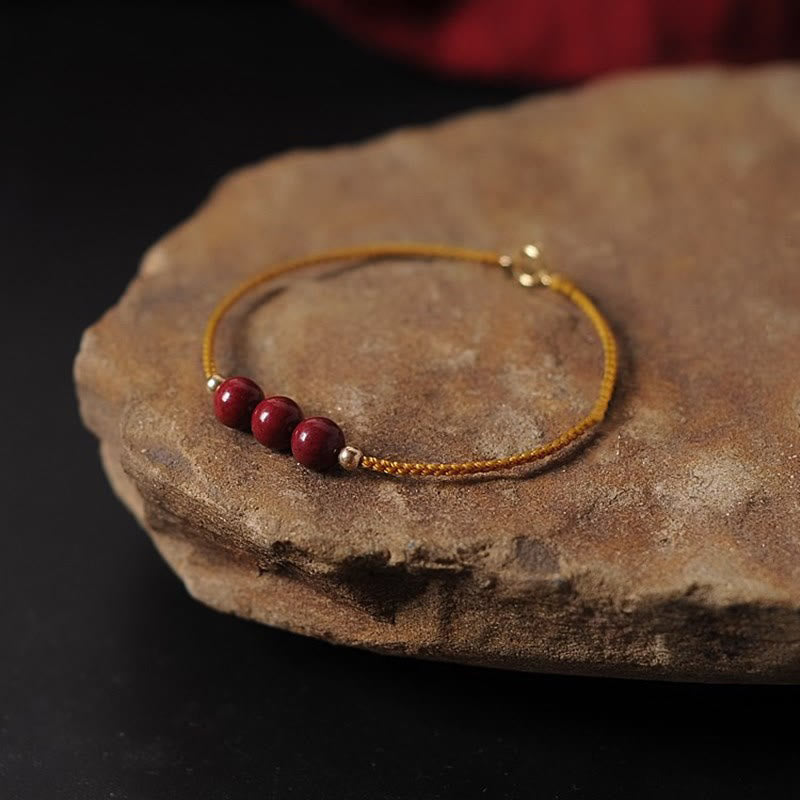 Bracelet tressé en fil de cinabre plaqué or 14 carats