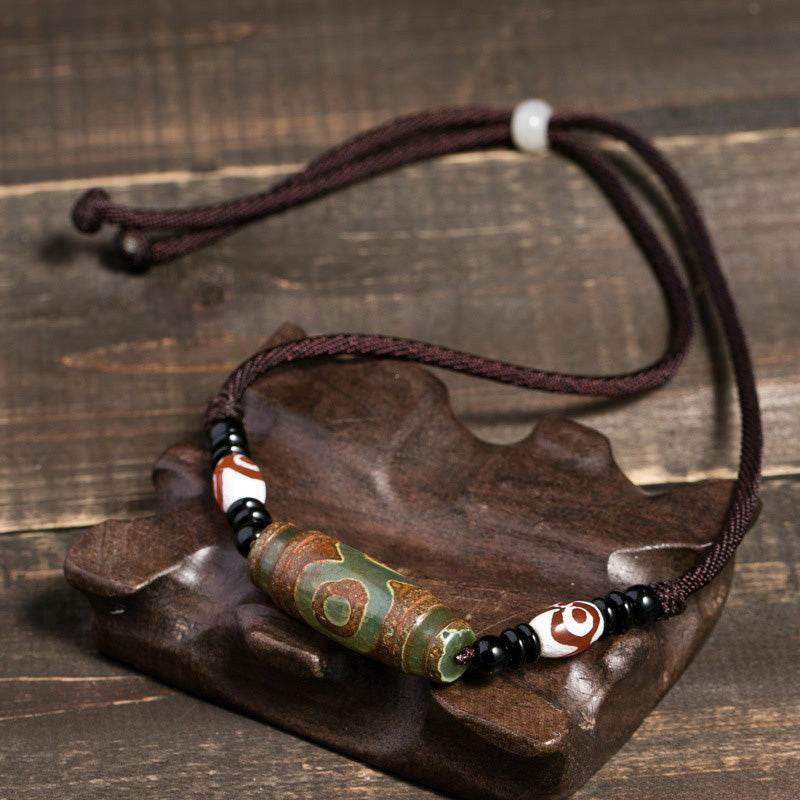 Collier unisexe en perles dzi à neuf yeux | Protection en agate
