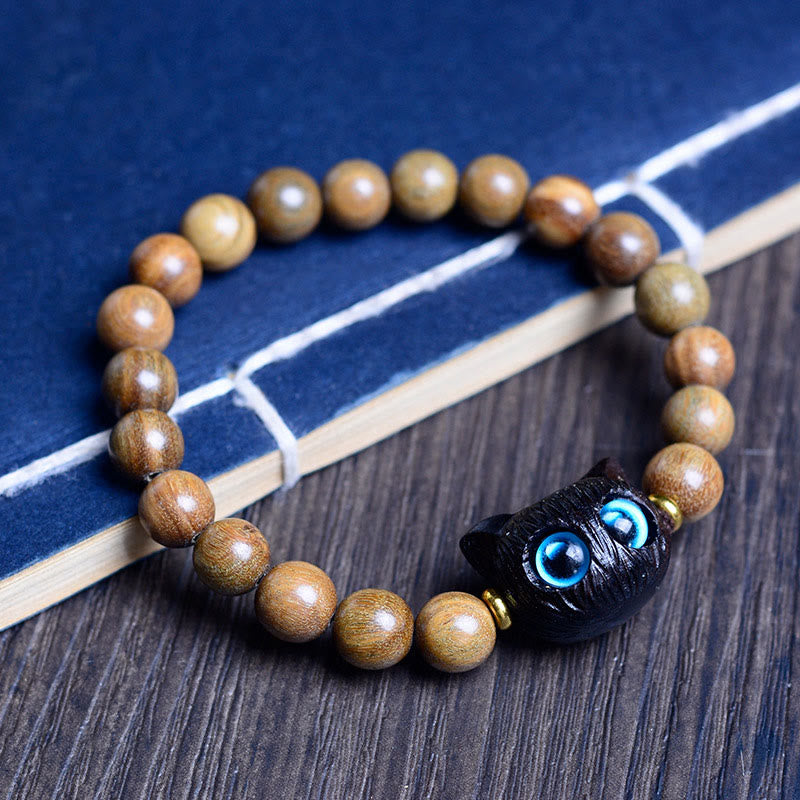 Bracelet d'équilibre en bois d'ébène pour chat pour la protection spirituelle