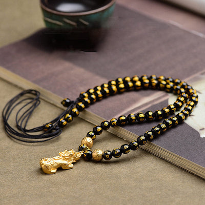 Collier Pixiu en obsidienne | Amulette Feng Shui pour la protection de la richesse