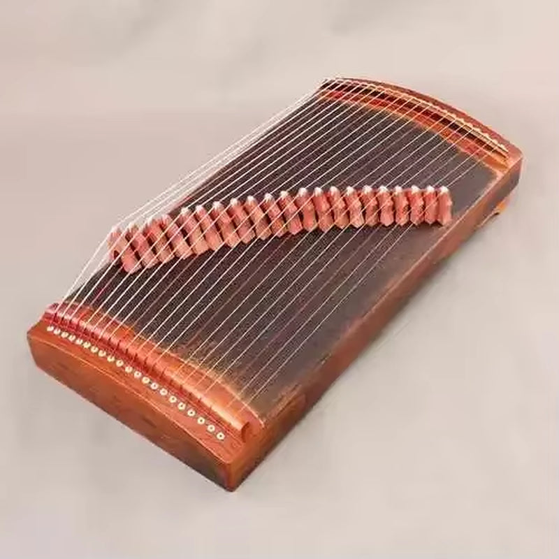 Traditional Chinese Guzheng zither with wooden body and parallel strings, 68 cm size