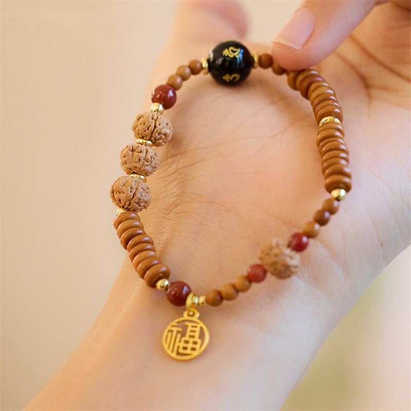 Bracelet Om Mani Padme Hum Graine de Bodhi et Onyx Noir