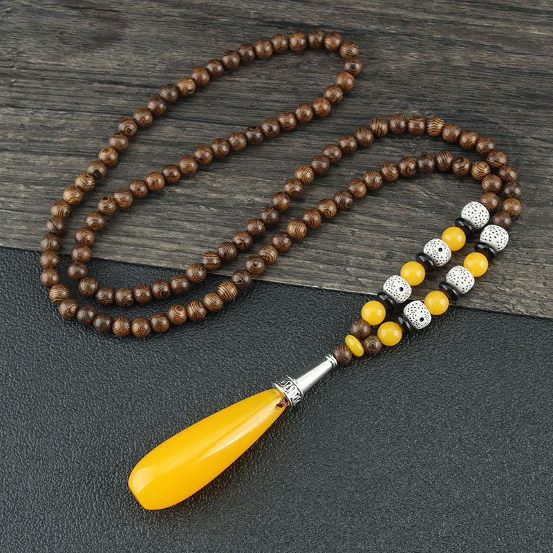 Collier d'équilibre en bois de wengé et agate pour la paix et la protection