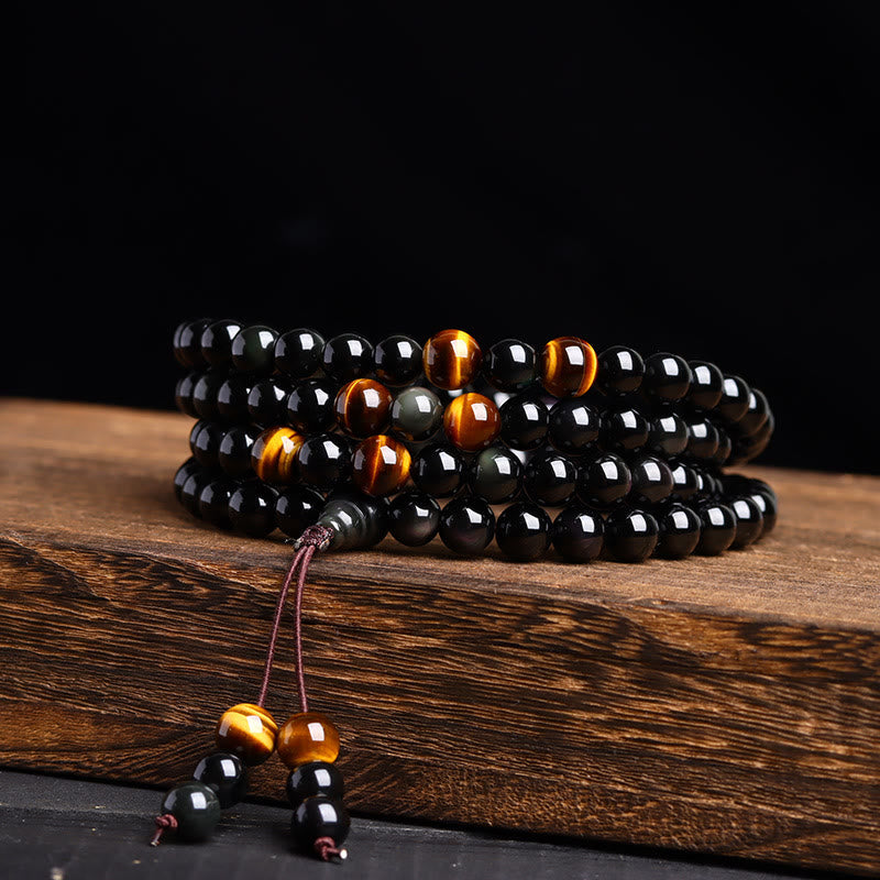 Bracelet Mala 108 perles en obsidienne noire œil de tigre de 6 mm