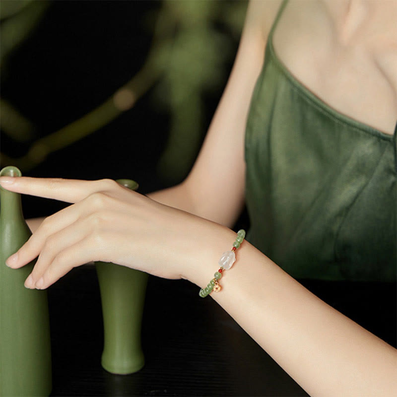 Bracelet en cuivre et jade Hetian de 6 mm pour la chance et la prospérité
