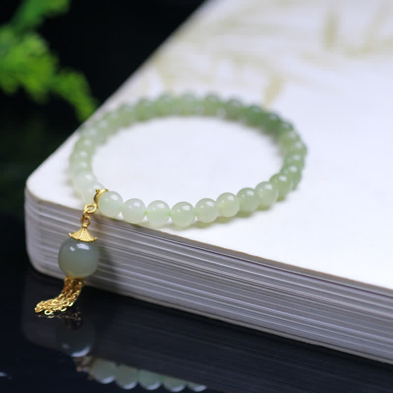 Bracelet à breloques en jade Hetian de 6 mm en argent sterling