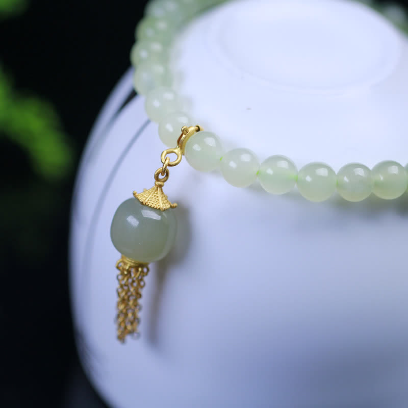 Bracelet à breloques en jade Hetian de 6 mm en argent sterling