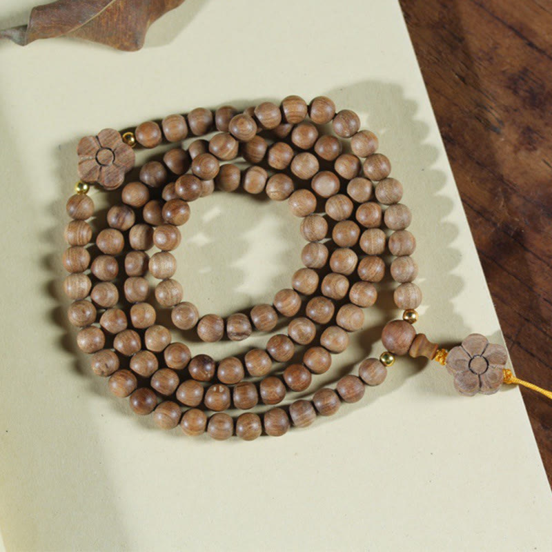Bracelet Mala à breloques en bois de santal et fleur de prunier de 6 mm pour le calme et la guérison