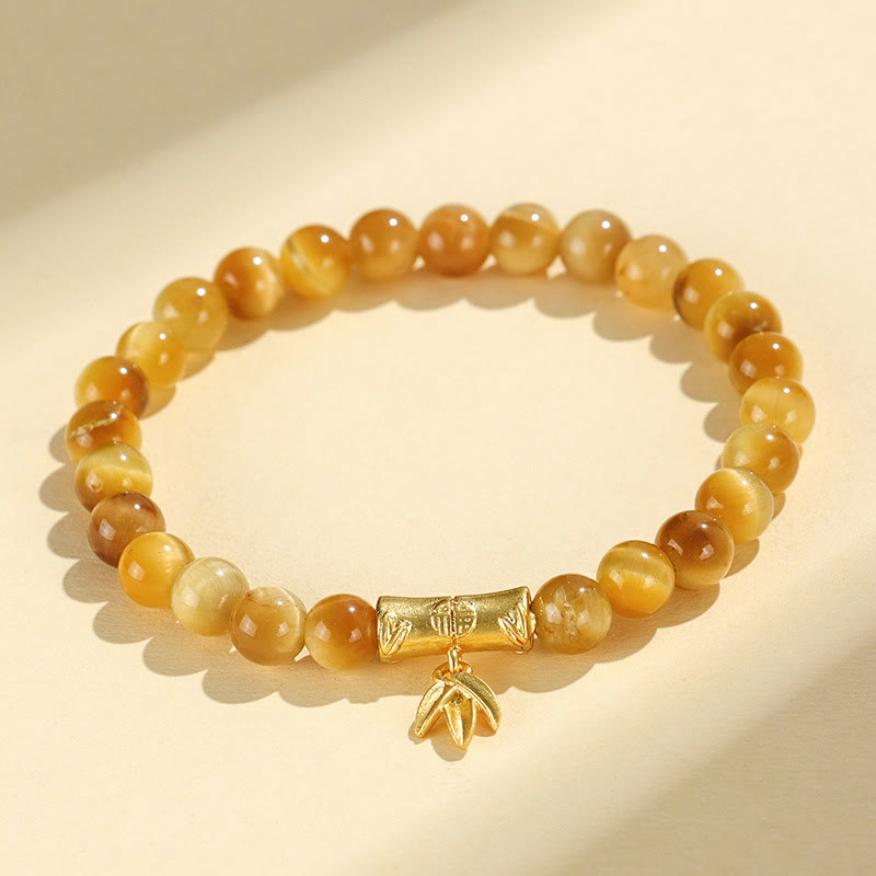 Bracelet de protection œil de tigre 6 mm avec perles symboliques lotus