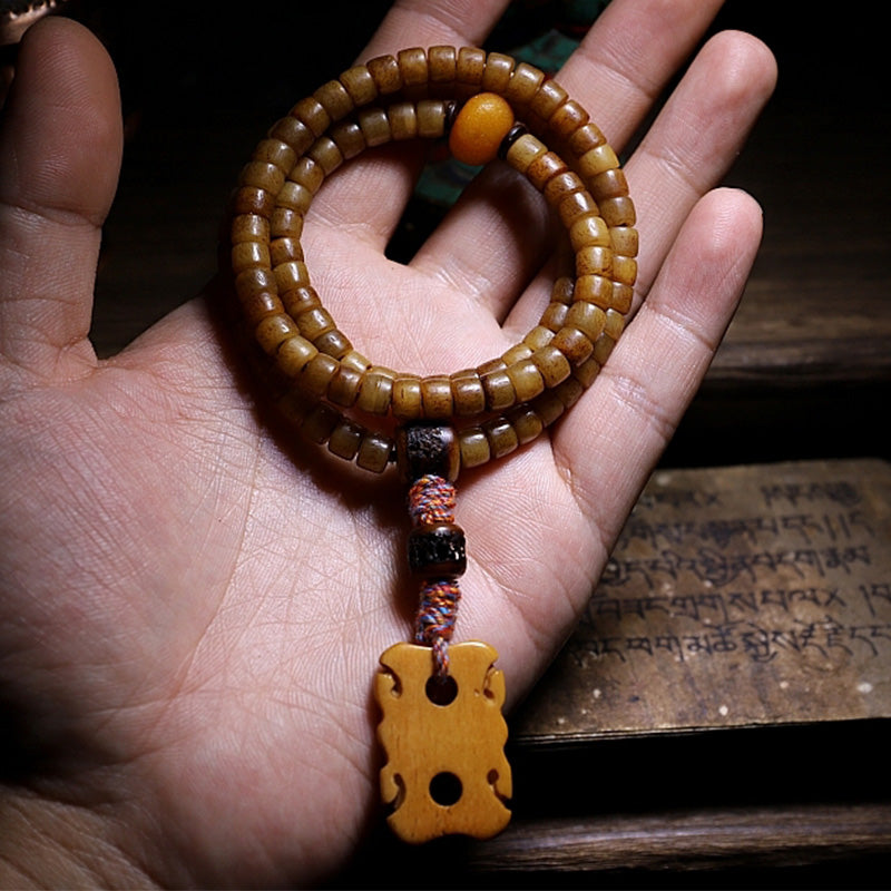 Bracelet Mala en os de yak et ambre à 108 perles pour l'équilibre
