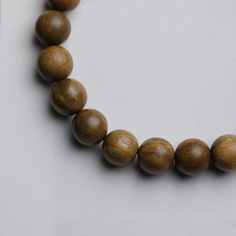 Bracelet apaisant en bois de santal vert et lotus pour la tranquillité et la paix