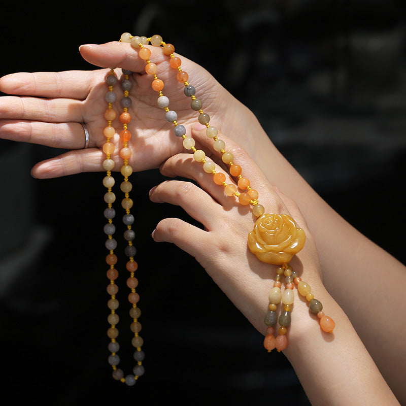 Collier pendentif en jade et soie dorée | Porte-bonheur