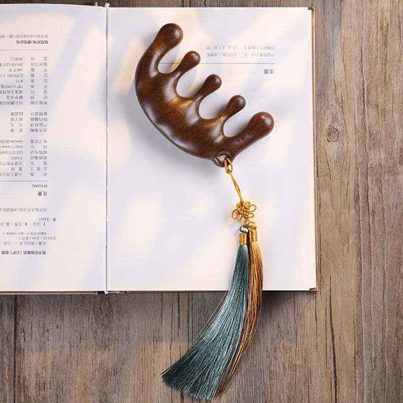 Peigne de massage à pompon en bois de santal vert pour une relaxation apaisante