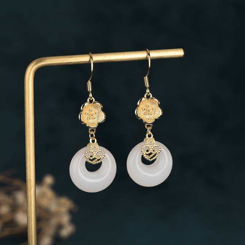 Boucles d'oreilles pendantes en jade blanc pour la protection et la chance