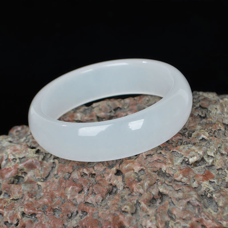 Bracelet jonc en jade et soie dorée 58 mm pour la richesse et la chance