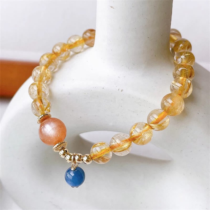 Bracelet de richesse en quartz rutile doré de 7 mm avec pierre de soleil et cyanite