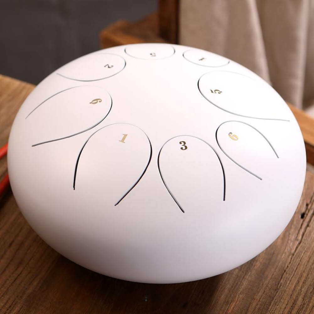 White Steel Tongue Drum with numbered tone zones for 8 Note F Key, ideal for children